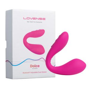 The main product image showing the bright pink, U-shaped LOVENSE Dolce Vibrator and its white retail box, labeled "Dolce by Lovense Bluetooth® Adjustable Dual Vibrator." This clitoris and G-spot vibrator is available from TheSexToysIndia.