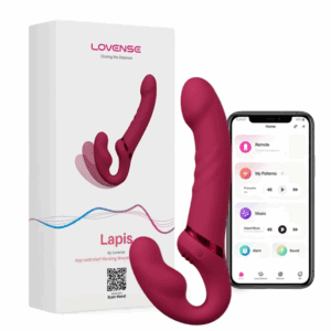 The main promotional image for the LOVENSE Lapis Strapless Strap on Dildo by TheSexToysIndia, showing the magenta-colored, hands-free toy next to a smartphone displaying the Lovense app for remote control, custom patterns, and music sync.