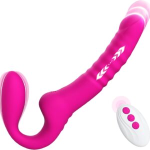 Studio image of the bright pink Remote Control Strapless Strap-On Dildo by TheSexToysIndia, showing its C-curve shape, textured shaft with moving lights, and the separate white wireless remote control.