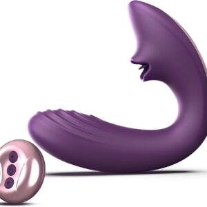 The deep purple Tracy's Dog Clitoral Licking G-Spot Vibrator, featuring a unique tongue-like stimulator and G-spot curve, shown with its rose gold remote control. Product from TheSexToysIndia.