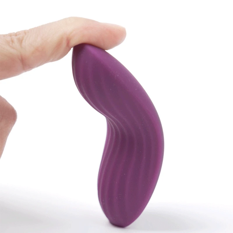 Close-up of Svakom Edeny app-controlled clitoral panty vibrator demonstrating its flexible curved shape and soft textured silicone body for comfortable wearable stimulation – TSTI India