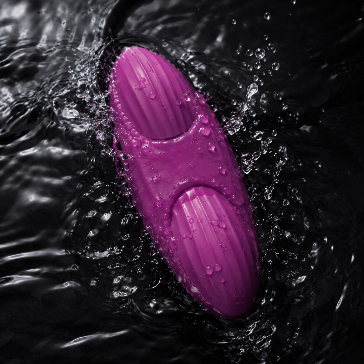 Svakom Edeny wearable clitoral panty vibrator with waterproof body shown splashing in water, highlighting its textured silicone design and durable construction – TSTI India